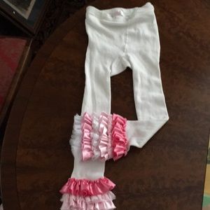 Girls white leggings with pink satin at bottom